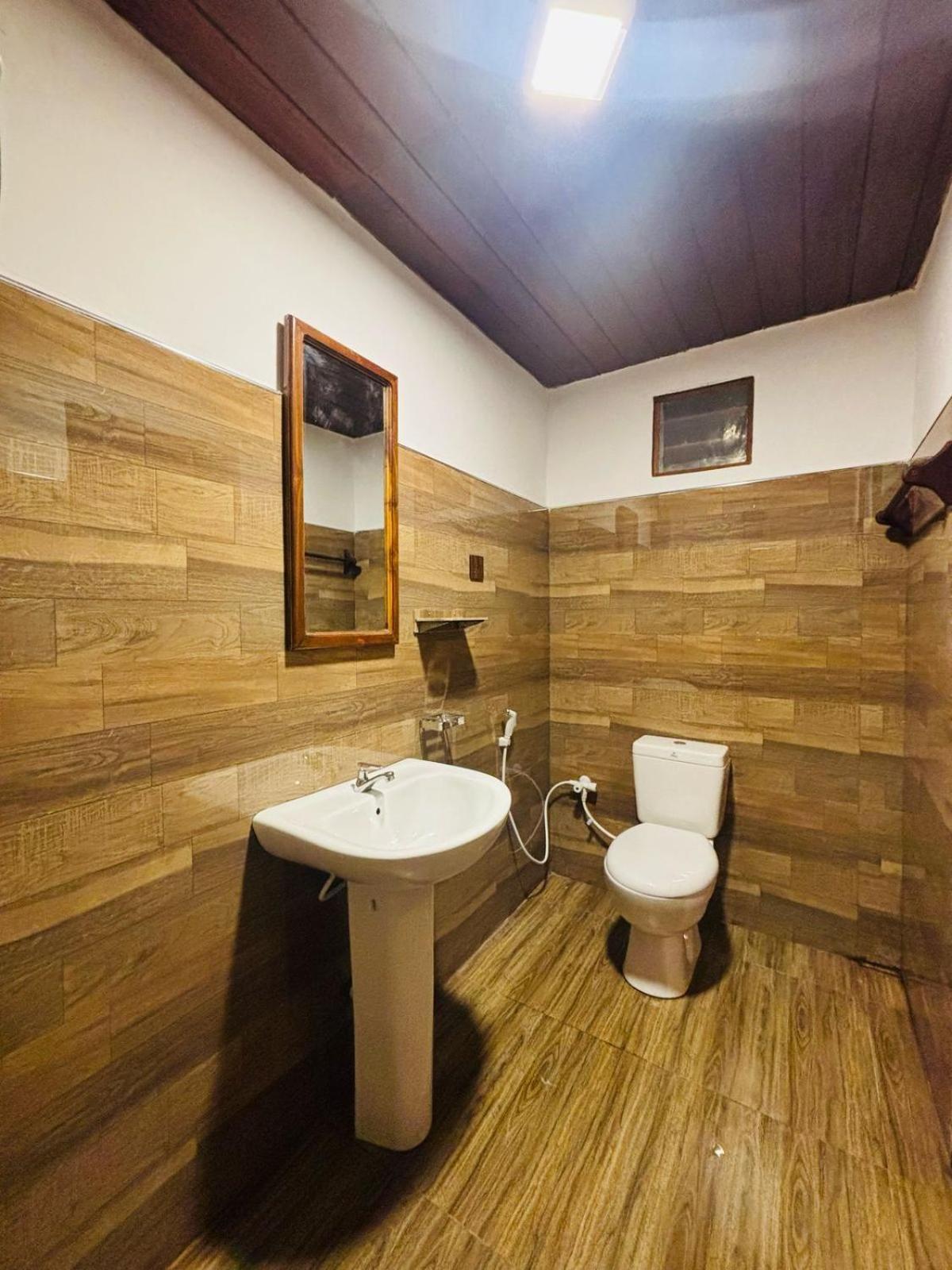 Woodholic Homestay Sigiriya Bagian luar foto